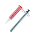 Two white pet pill shooter dispensers with soft silicone tips and push rods for administering tablets to cats and dogs.