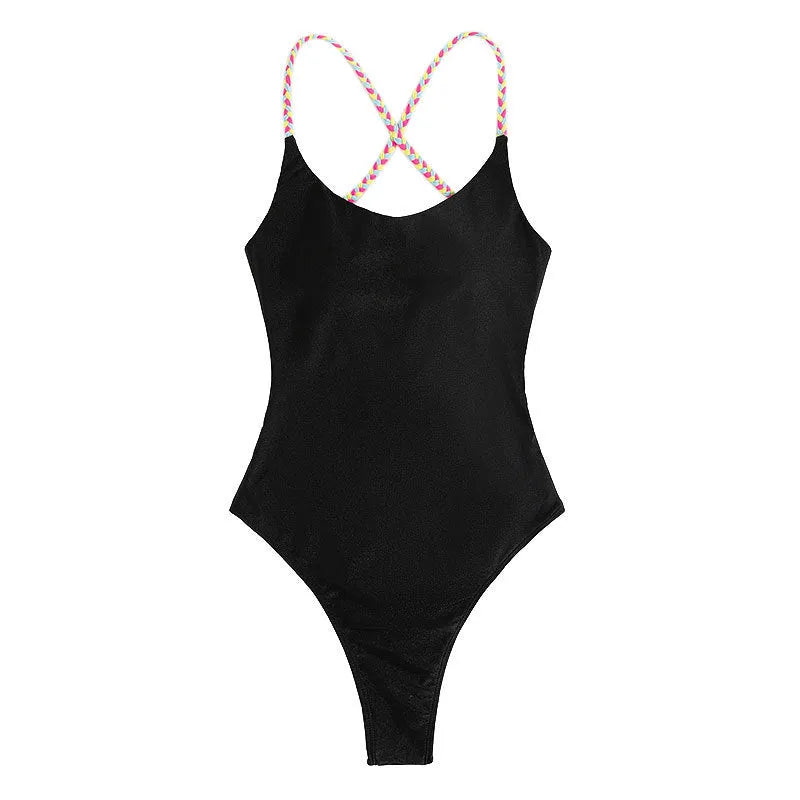 Black backless one-piece swimsuit on a white background
