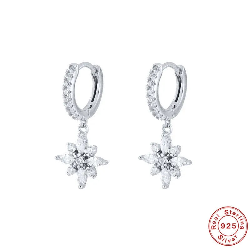 Sterling silver snowflake pendant earrings with diamond accents in gold colour options