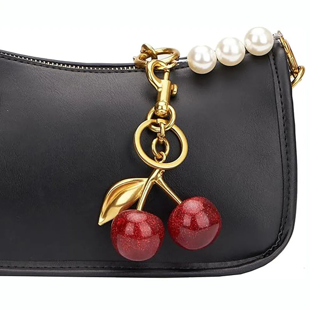 Alloy three-dimensional cherry design key ring pendant in red or pink colour options