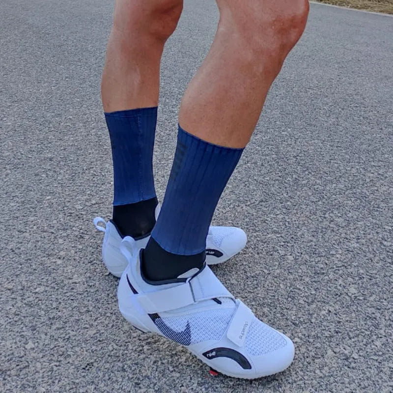 Athletic socks for sports in orange, black, purple, white, grey, and dark blue colours