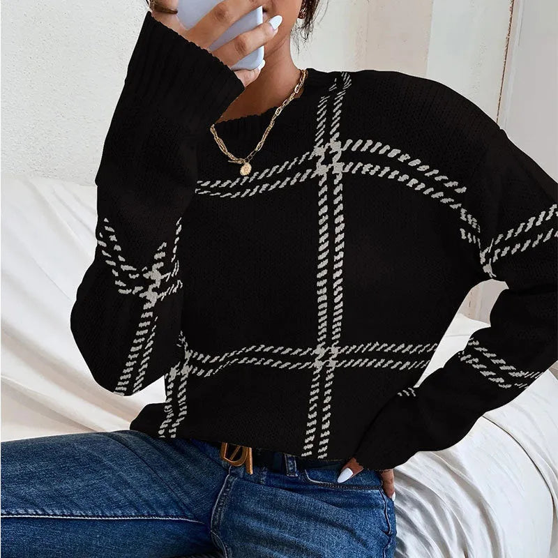 Women's loose-fitting plaid colour-block acrylic pullover sweater showing apricot, black, beige, red and green stripes