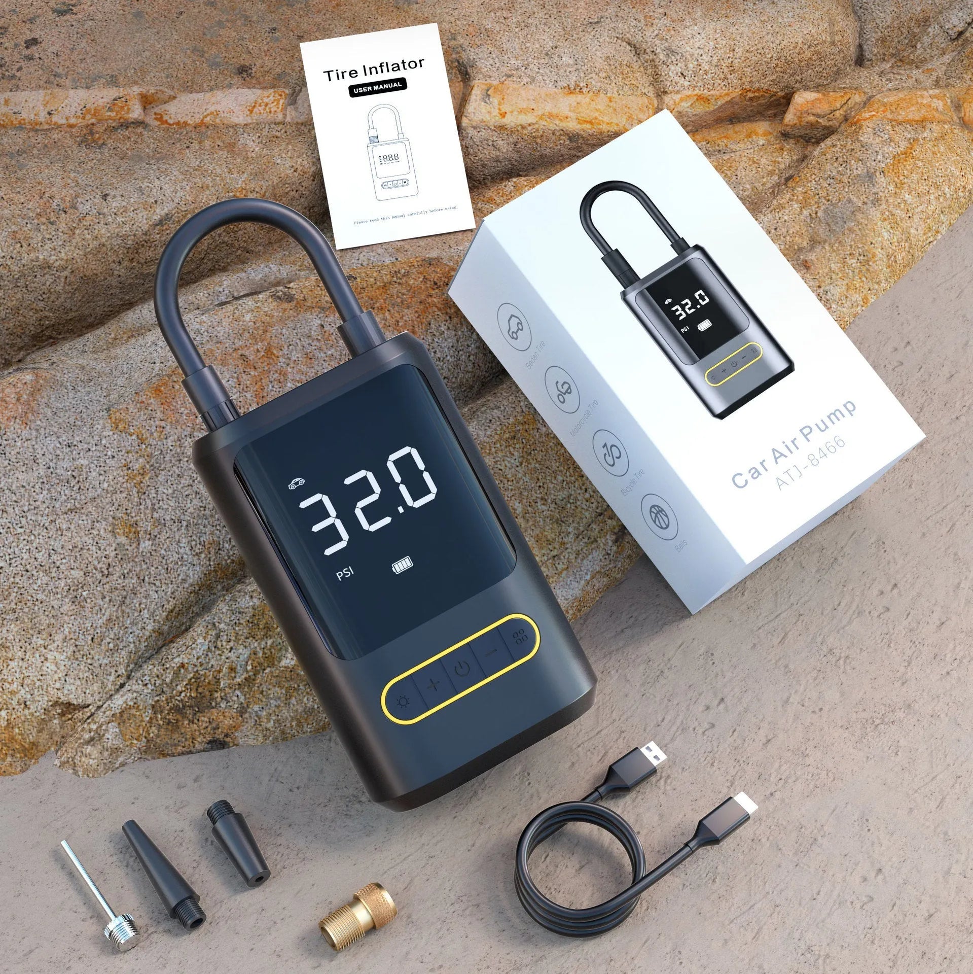 Black handheld wireless digital tyre inflator with LED display and flexible hose on a grey background.