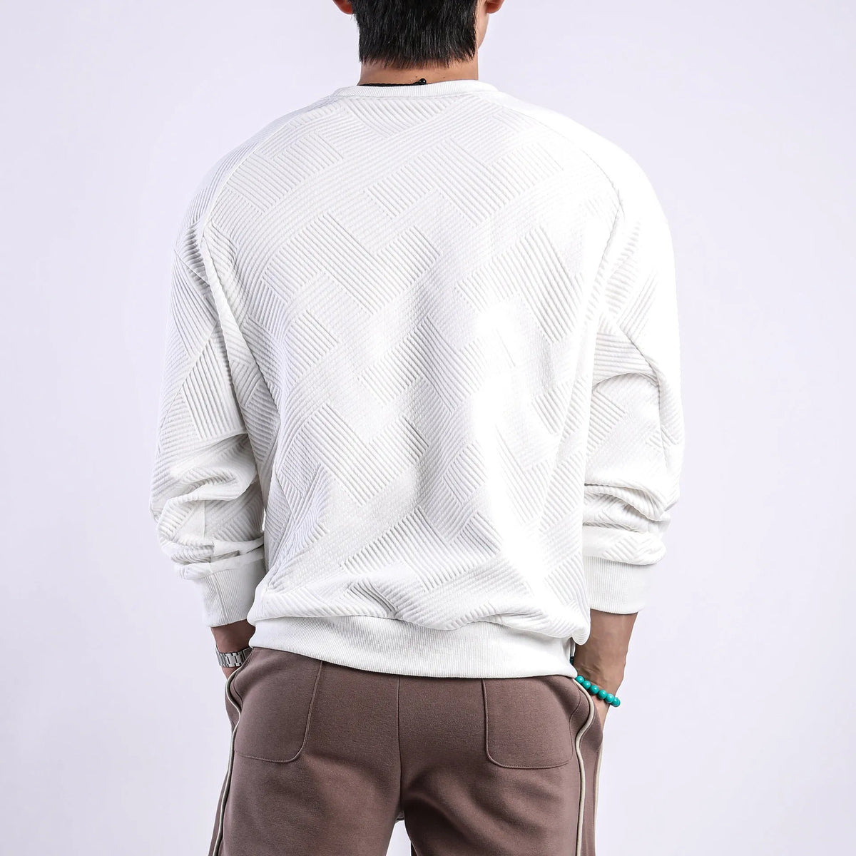 Men's army green twill Jacquard pullover sweater with round neck and long sleeves laid flat