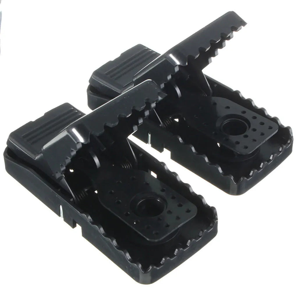 Six black snapping mousetraps made from alloy plastic with dimensions 11cm by 5cm
