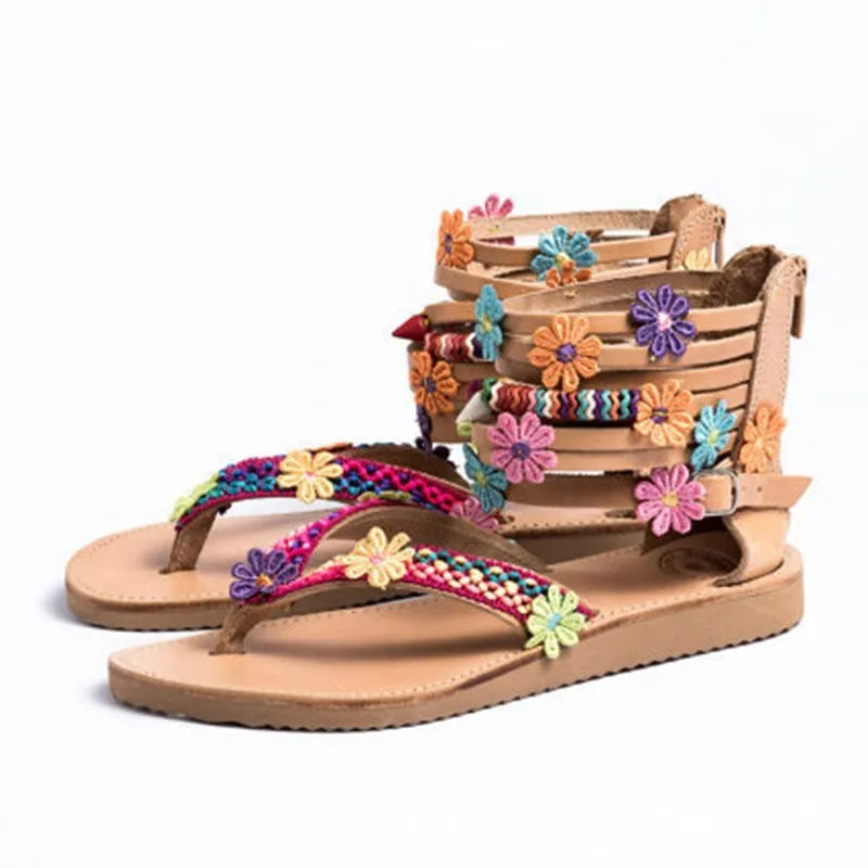Women's beaded petal floral sandals with ethnic design on a light background.