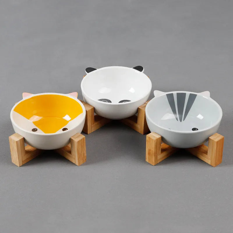 Raised ceramic cat food bowl in bamboo and wooden bracket, 13cm pottery dish, pink-eared fox design