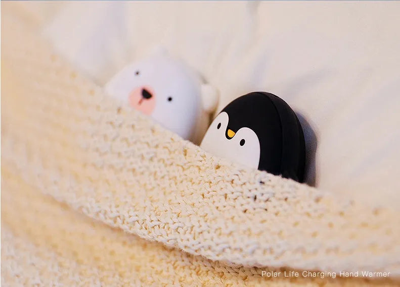 Cartoon penguin and polar bear USB rechargeable electric hand warmer showing dimensions