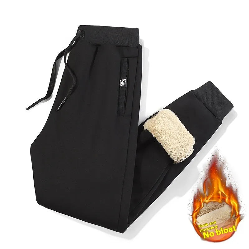 Men's fleece-lined track pants in grey or black with elastic mid-waist and plus-size fit options