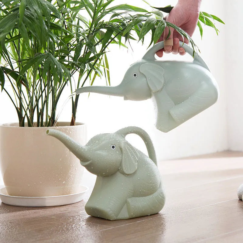 Elephant-shaped pink children's watering can with long nozzle and baby bottle handle
