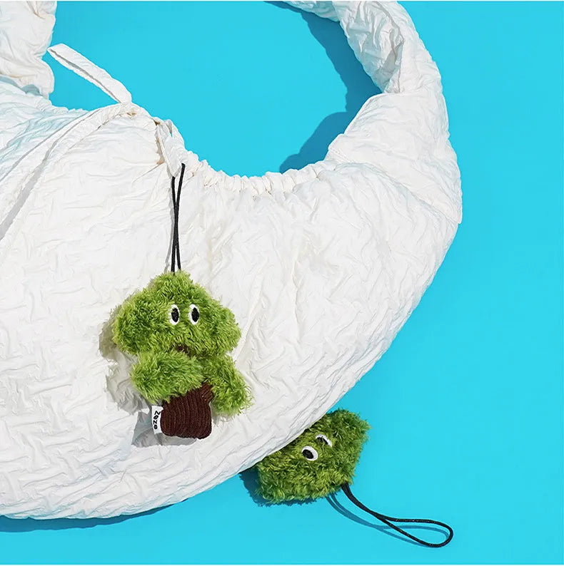 Pine wood base cat toy with fabric catnip pouch hanging from a string.