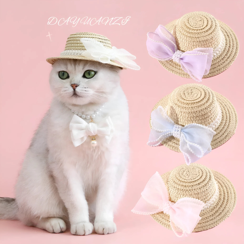 Woven straw hat for cats with pearl butterfly bow in princess style, shown in pink colour