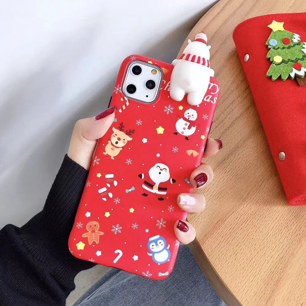 Christmas design silicone back cover case for various iPhone models on a red background.