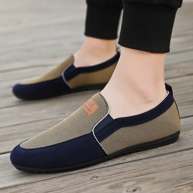 Men's solid-colour canvas board shoes with round toe and rubber sole in grey and khaki options.