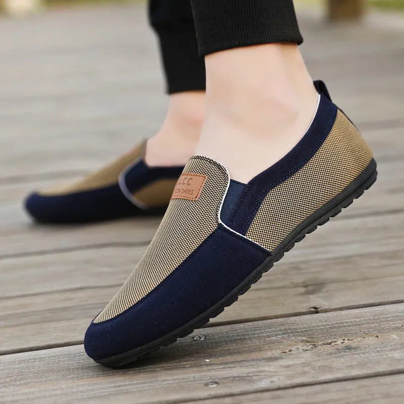 Men's solid-colour canvas board shoes with round toe and rubber sole in grey and khaki options.