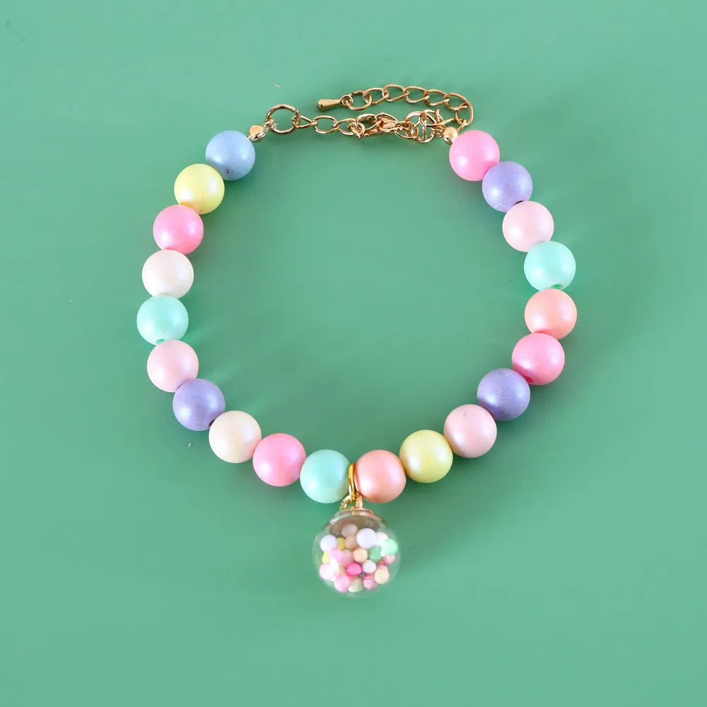 Macaron-coloured pet accessory set with resin headdress, collar, necklace and bracelet for photography