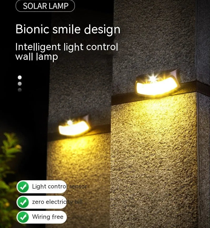 Solar outdoor wall lamp with smiling face design for garden and courtyard lighting