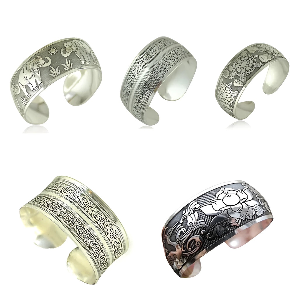Carved open alloy bracelet with Miao ethnic design in elephant or turtle colour finish
