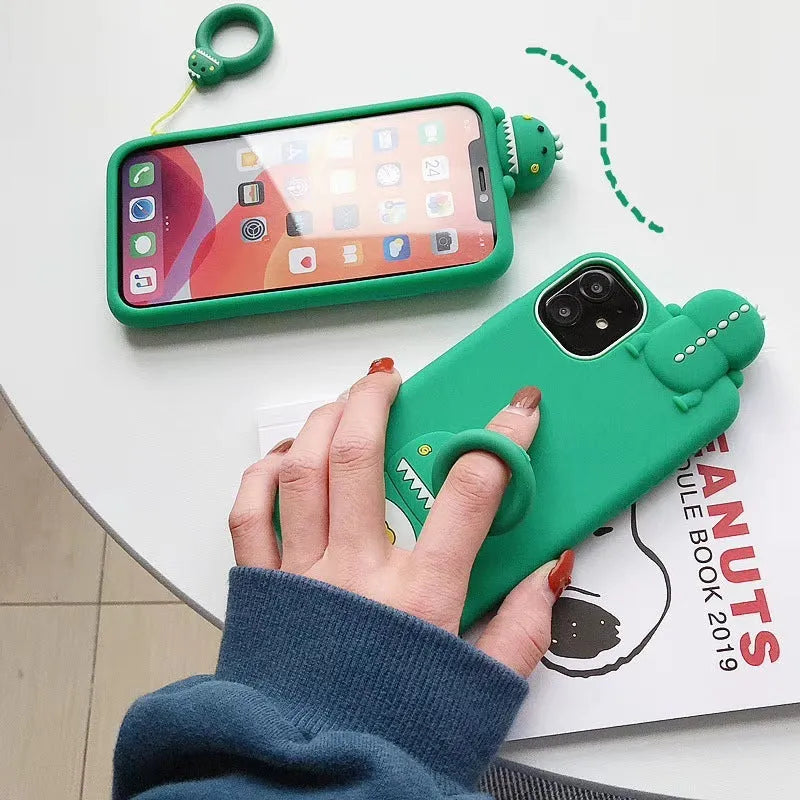 Green silicone iPhone case with cartoon animal design showing back cover protection
