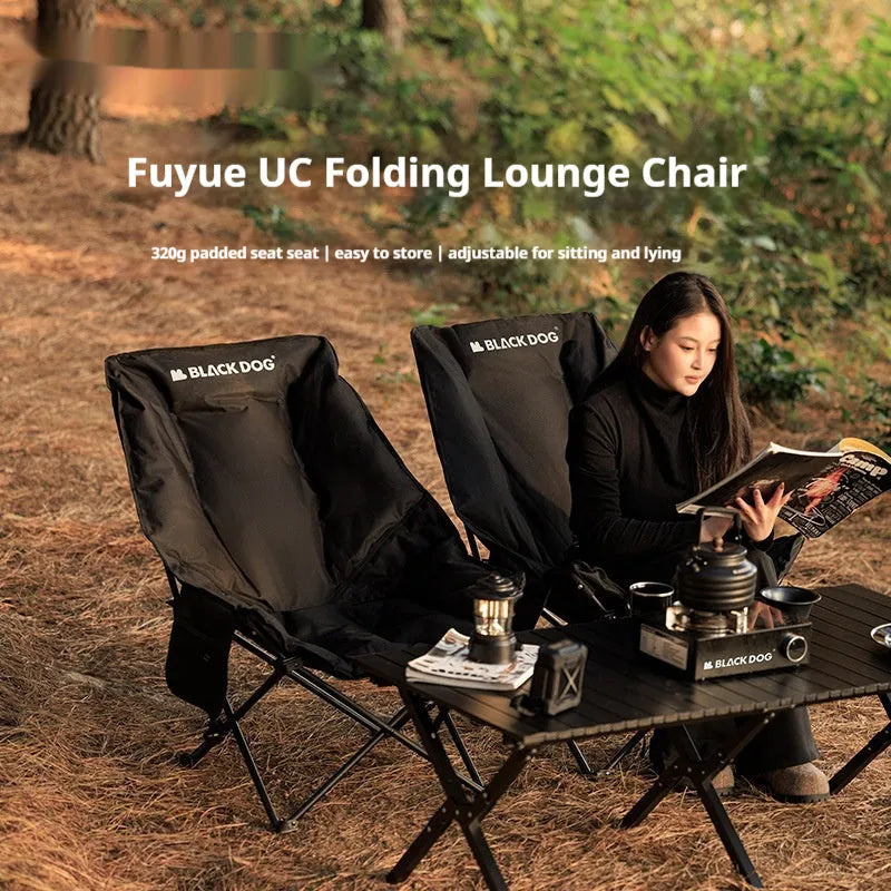 Night black Oxford cloth folding moon chair in camping and beach setting
