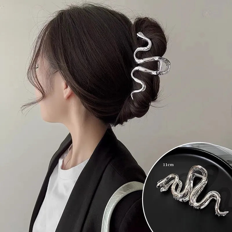Slytherin serpentine metal hair barrette showing 10.5cm snake design in silver electroplated finish