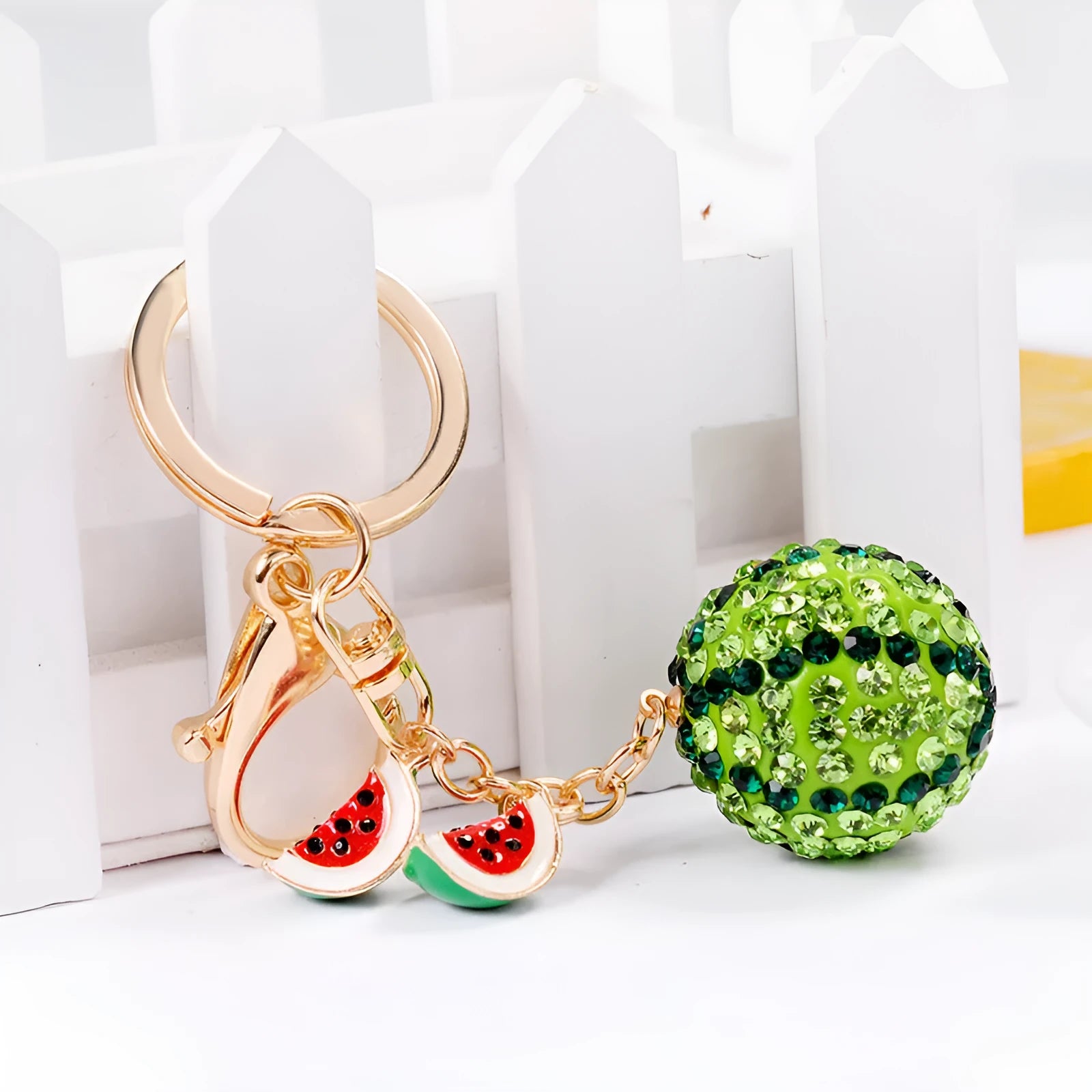 Green watermelon slice keychain made from zinc alloy measuring 12cm long