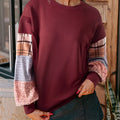 Women's loose long-sleeved top with plaid stitching detail in apricot colour