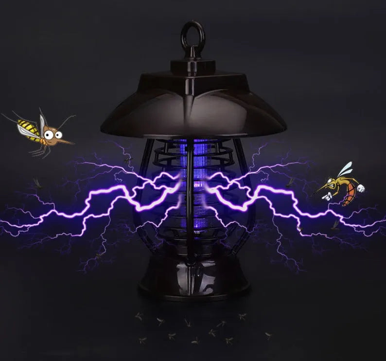 Black solar-powered mosquito lamp with solar panel and white LED light for outdoor insect control