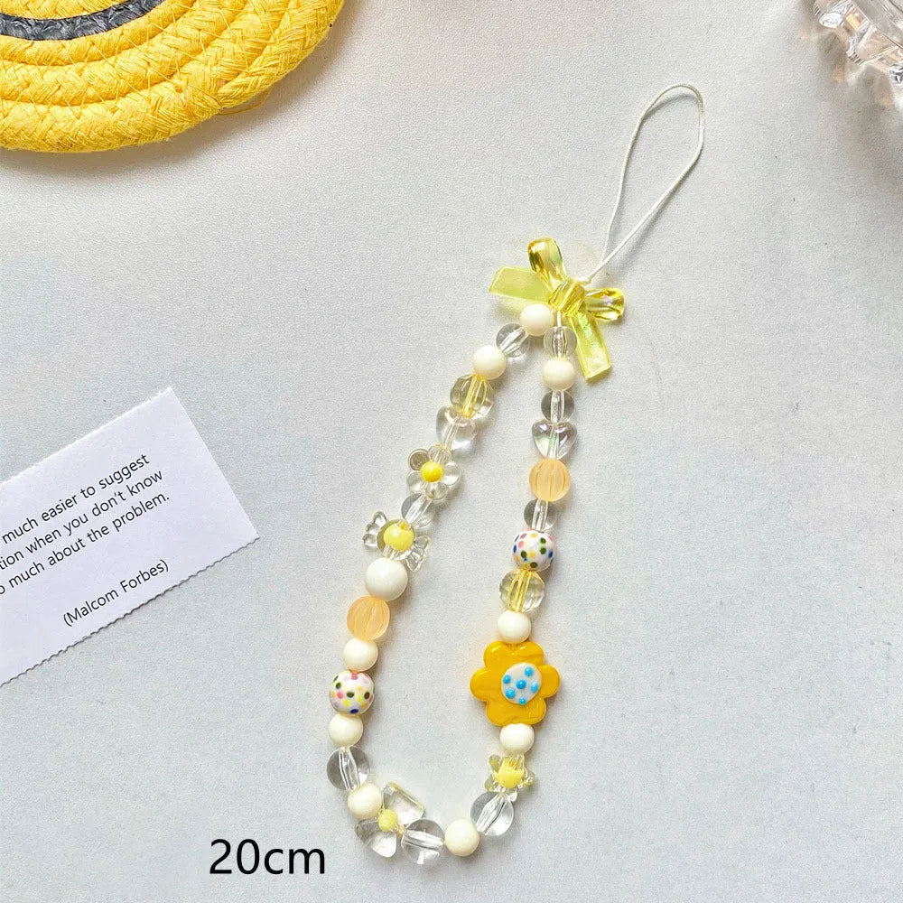 Flower bead mobile phone lanyard with hand rope in yellow, blue, and pink colour options