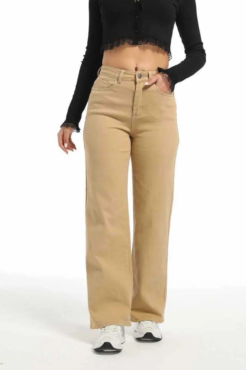 Women's high-waisted straight leg wide jeans in apricot colour on a hanger.