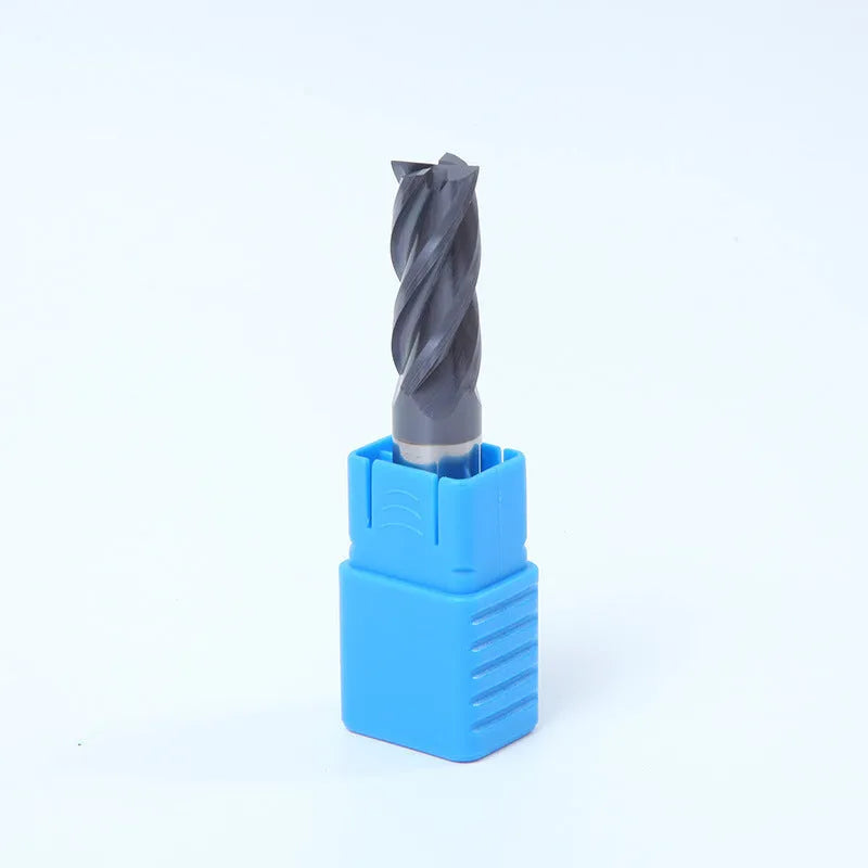 Carbide milling cutter with spiral flutes and straight shank on a grey background.