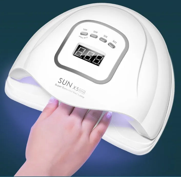 White nail polish baking lamp with UV LED lights and timer controls for gel manicure drying