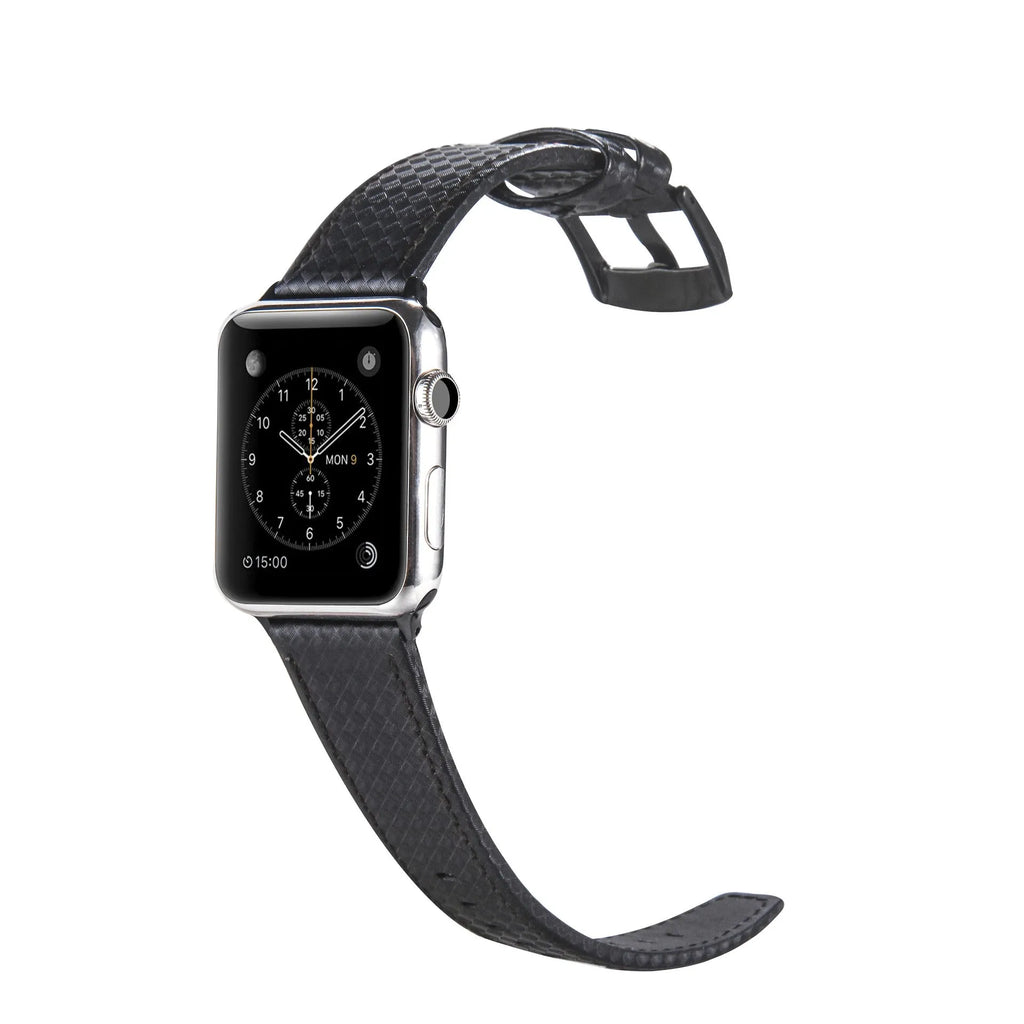 Apple Watch with black leather strap, carbon fibre details, and PC hard shell case with carbon fibre pattern.