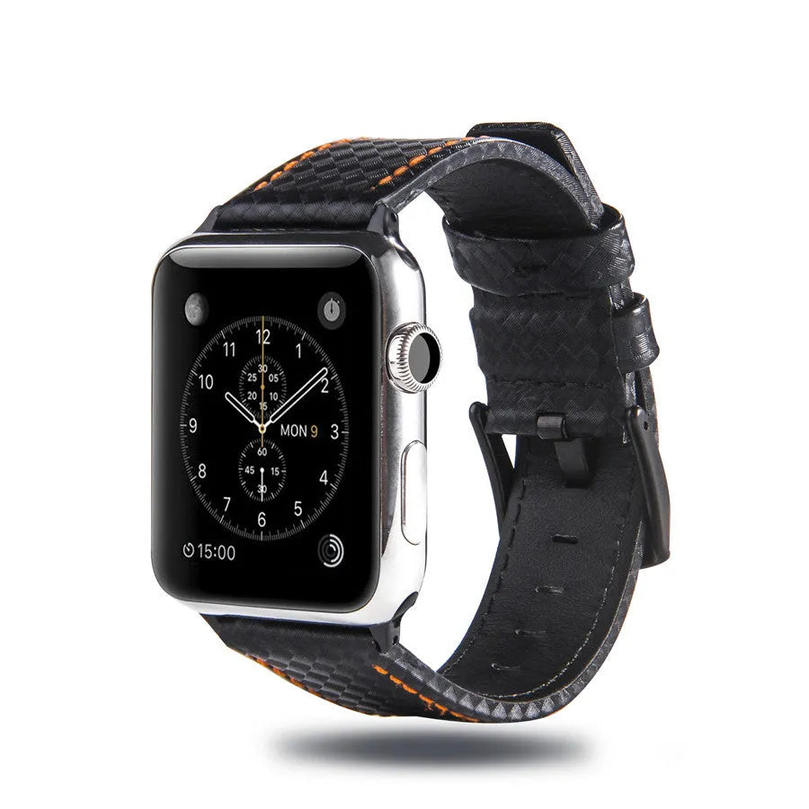 Apple Watch with black leather strap, carbon fibre details, and PC hard shell case with carbon fibre pattern.