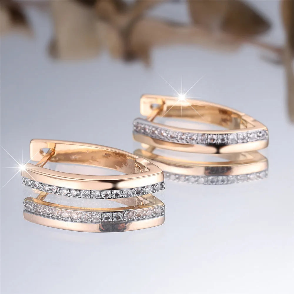 Women's geometric V-shaped ear clips with champagne gold electroplating and white diamond accents