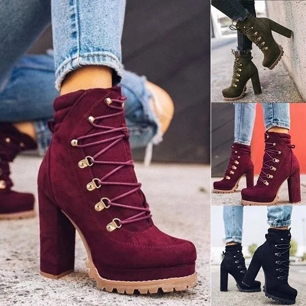 Women's suede ankle boots with a thick high heel, round toe, and decorative buckle on a waterproof platform.