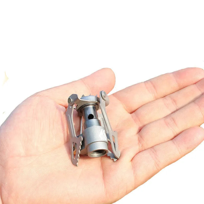 Portable propane camping stove with one-piece furnace for outdoor use