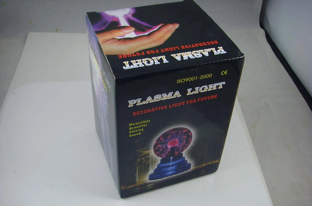 Magic light ball with colourful changing effects in 7.62cm glass sphere on ABS base