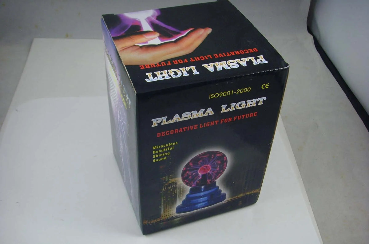 Magic light ball with colourful changing effects in 7.62cm glass sphere on ABS base