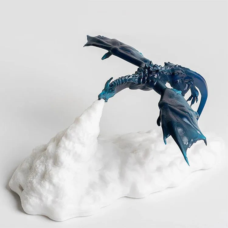 3D printed red dragon lamp lit up with warm glow on a dark surface