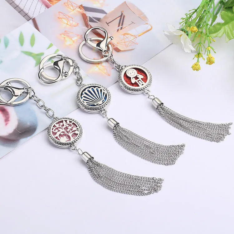 Alloy car pendant with coloured tassel and 50cm chain for aromatherapy fragrance diffusion