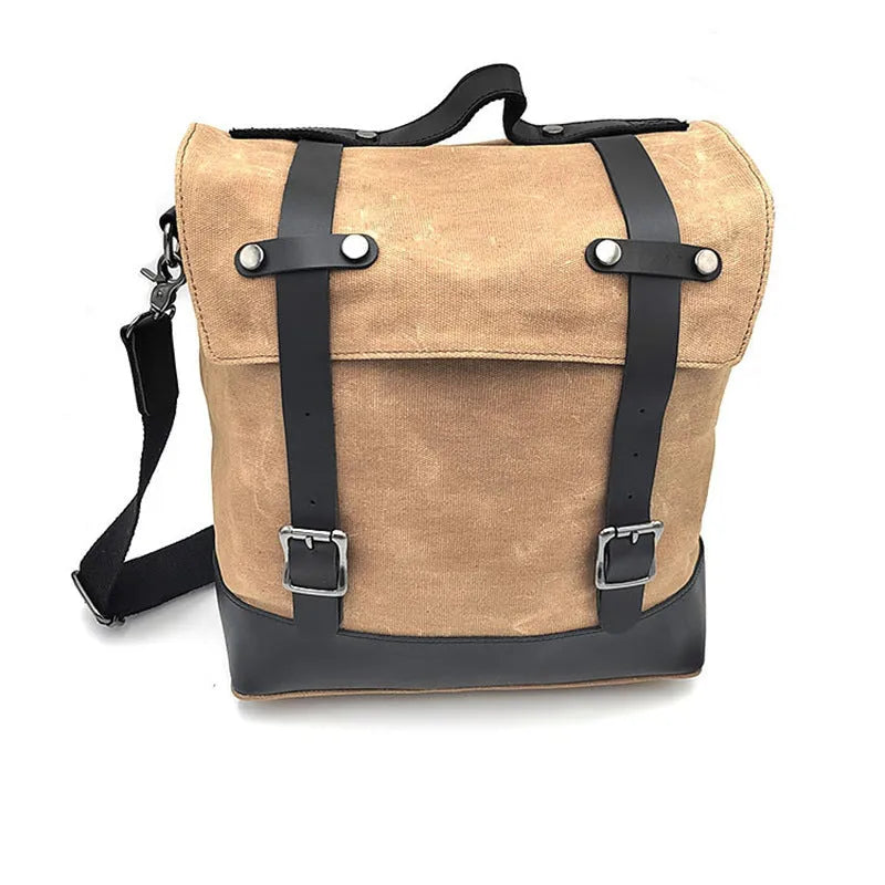 Waterproof canvas motorcycle side pannier bag with cowhide reinforcement in black colour