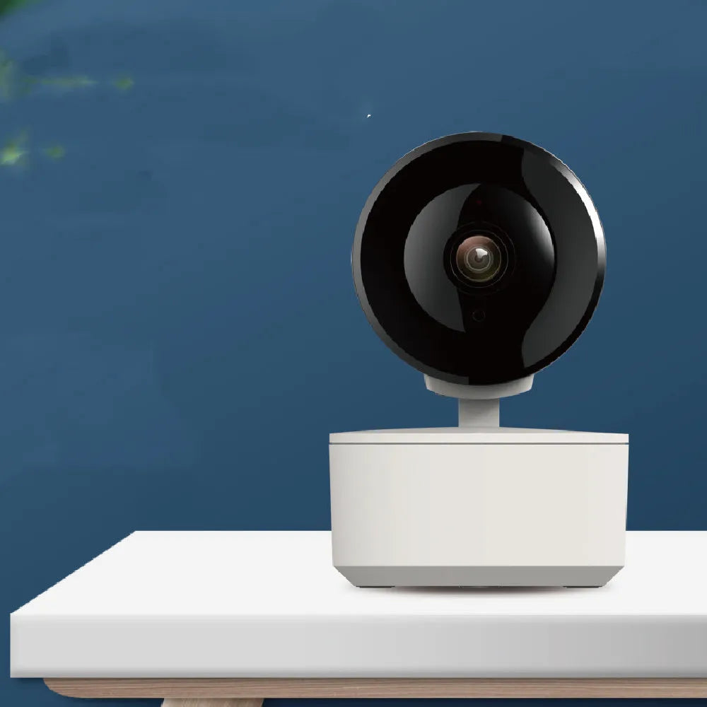 Indoor smart WiFi security camera with pan-tilt base on a desktop.