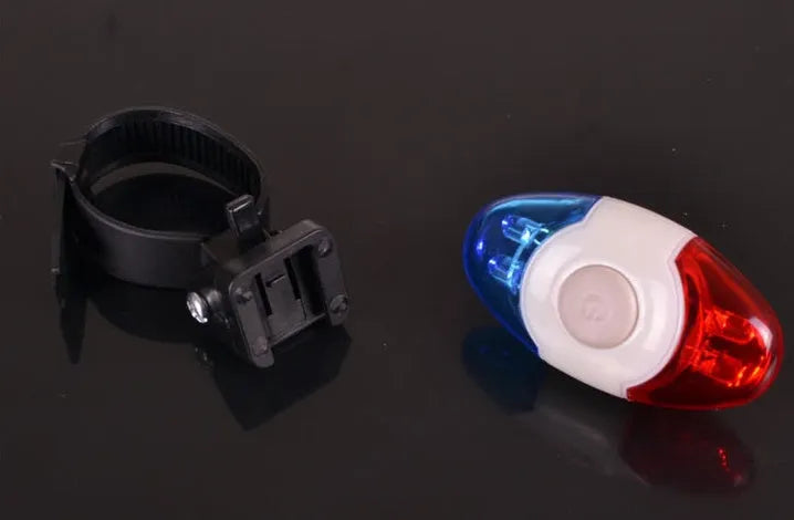 Red and blue LED bicycle tail light with adjustable mounting base