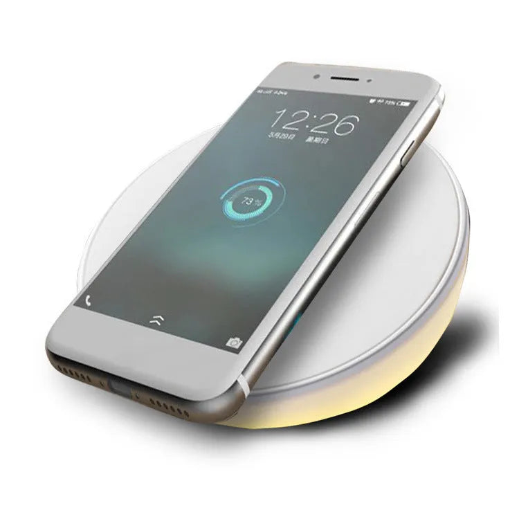 White wireless phone charger with clock display and three control buttons
