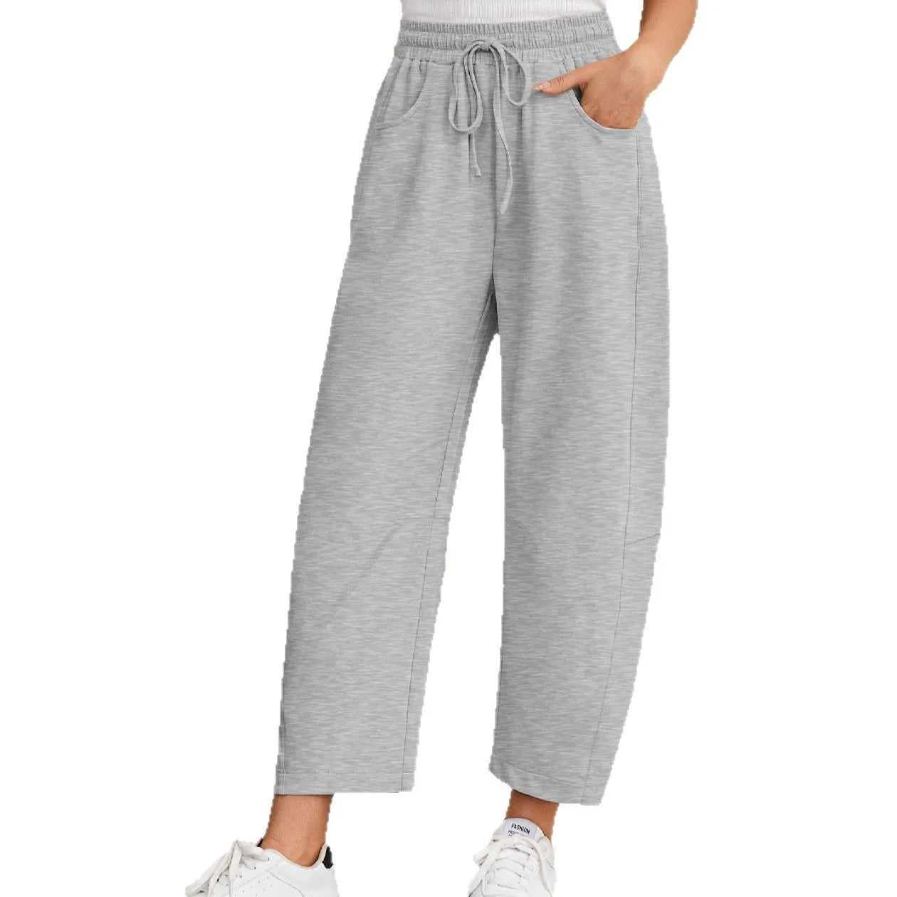 Loose cropped sports sweatpants with elastic waistband and drawstring in multiple colour options