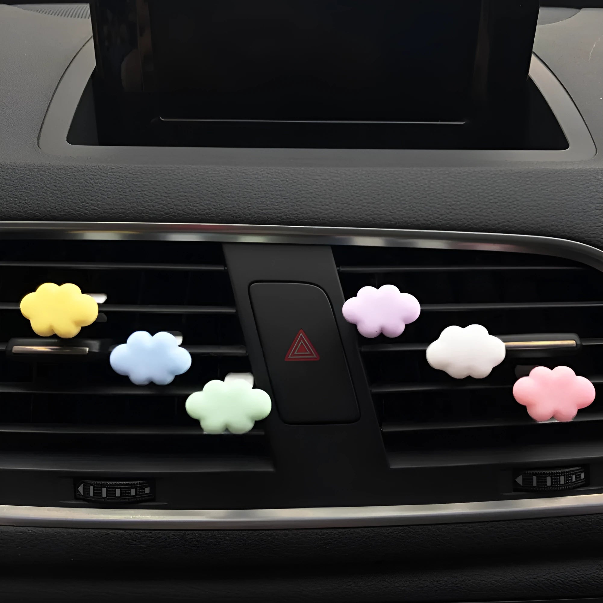Resin cartoon car fragrance clip in light green colour mounted on car air vent
