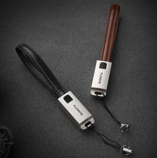 Red leather and zinc alloy braided USB C to Apple Lightning charging cable, 20cm long.