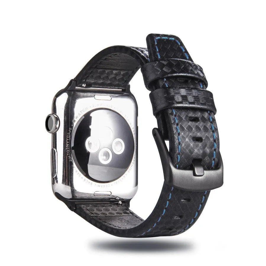 Apple Watch with black leather strap, carbon fibre details, and PC hard shell case with carbon fibre pattern.