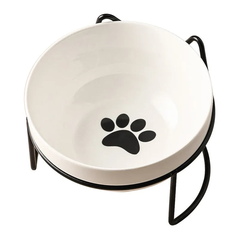 Ceramic pet bowl with iron frame featuring cat footprints pattern